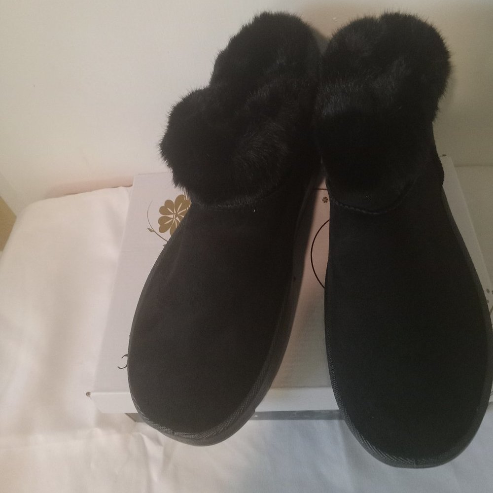 Ke Di designs black fur booties